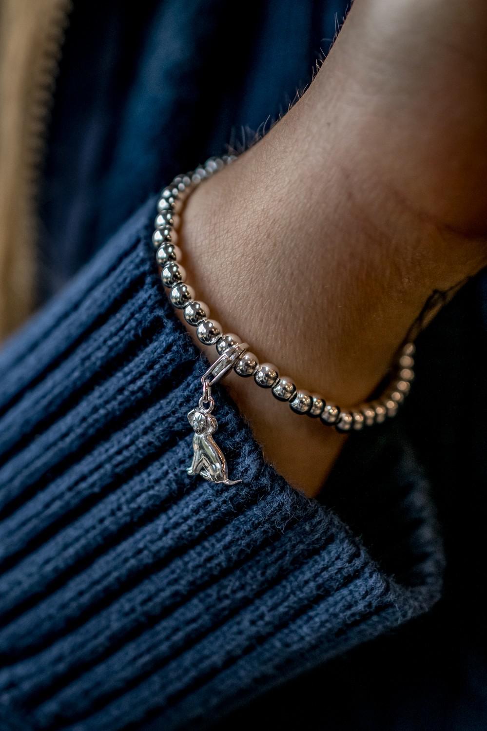 Exclusive Sterling Silver Rounded Beaded Bracelet With Charm