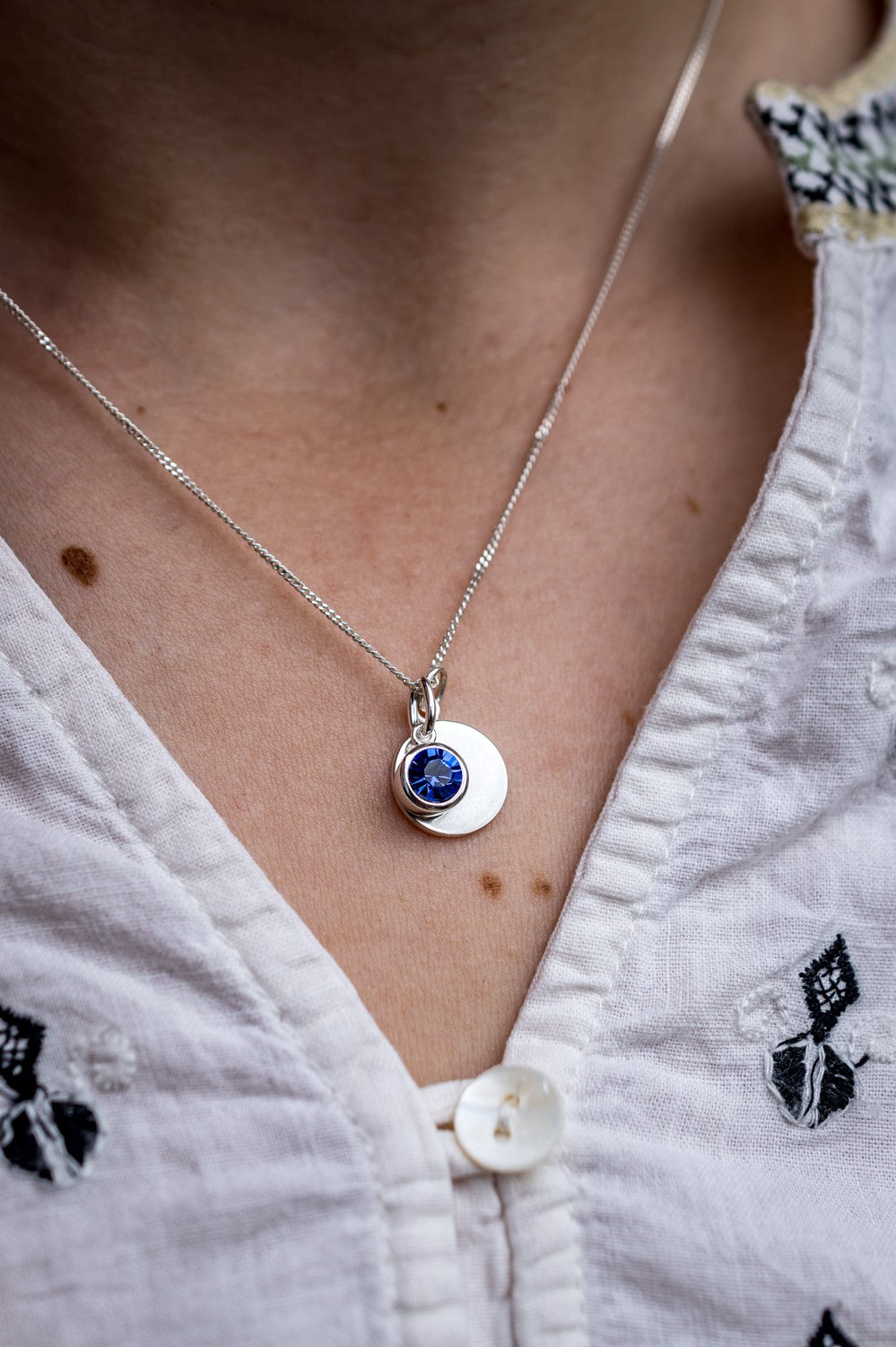 September Birthstone - Sapphire Blue CZ & Silver Disc Necklace