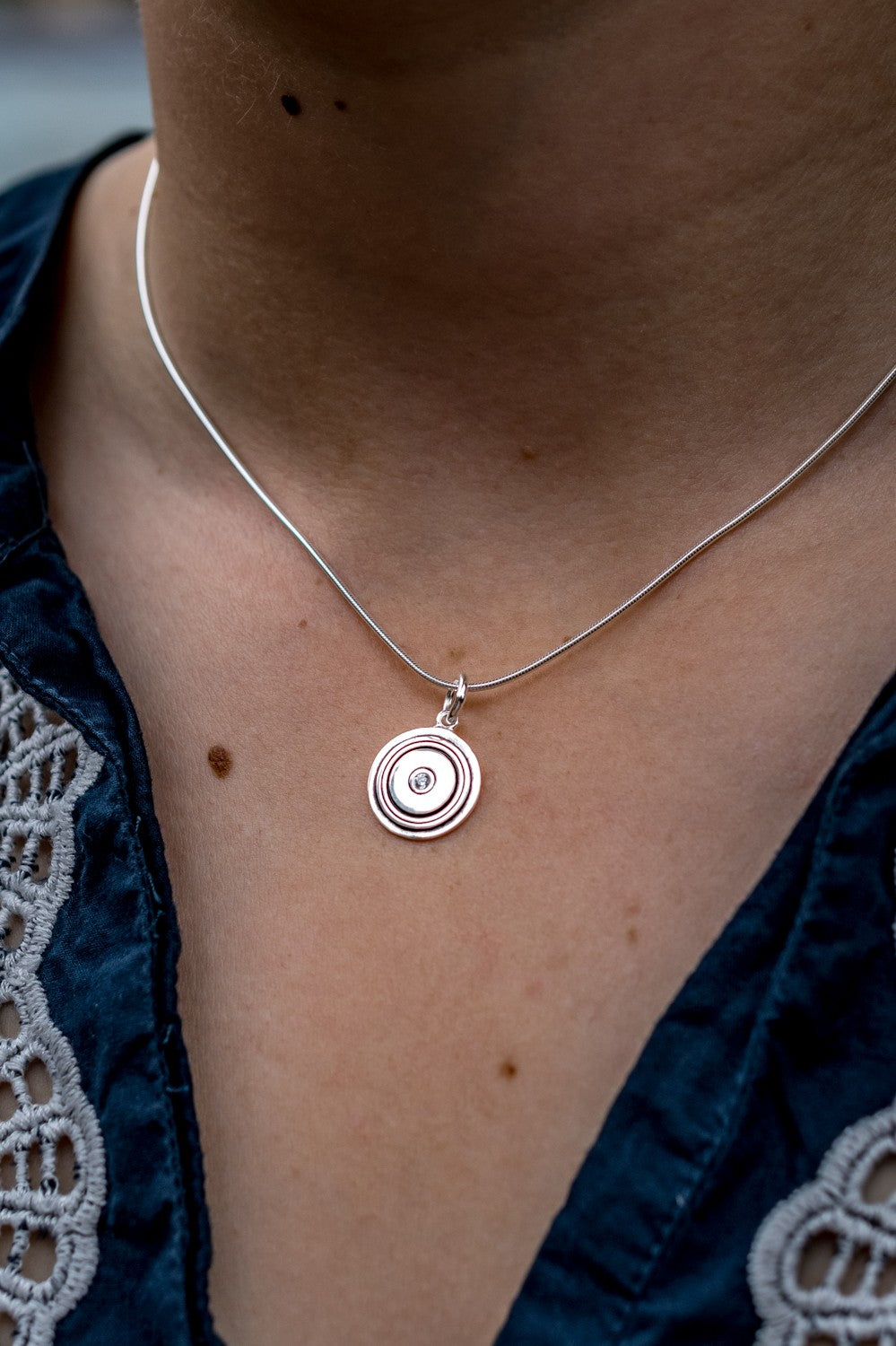 Exclusive Sterling Silver & CZ Shotgun Clay Necklace