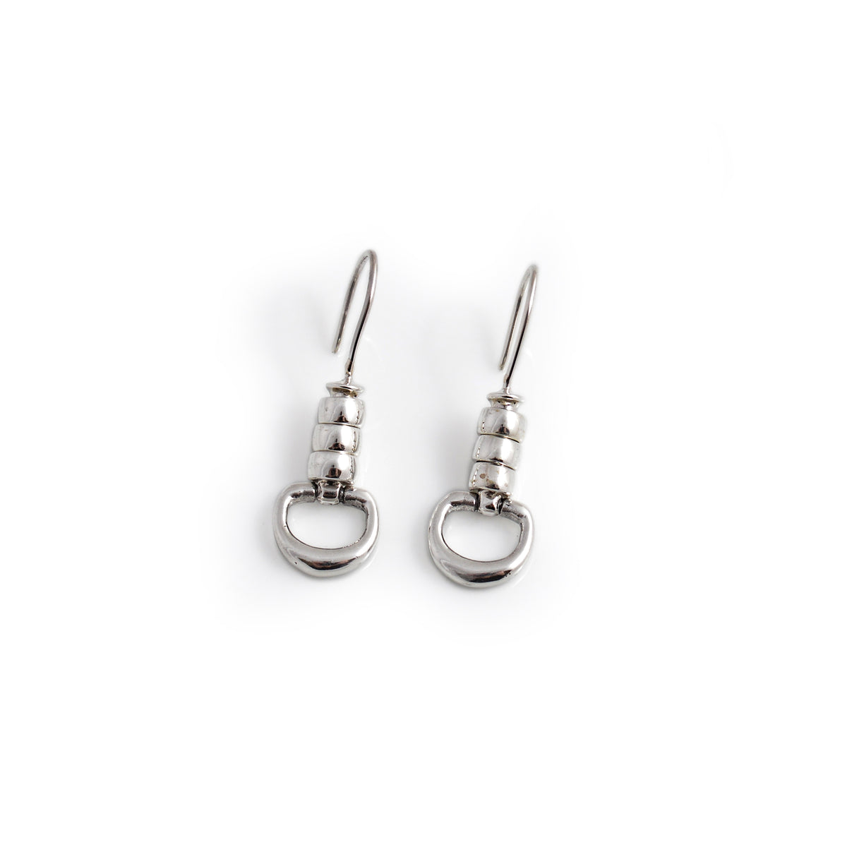 Pair of silver earrings on a white background