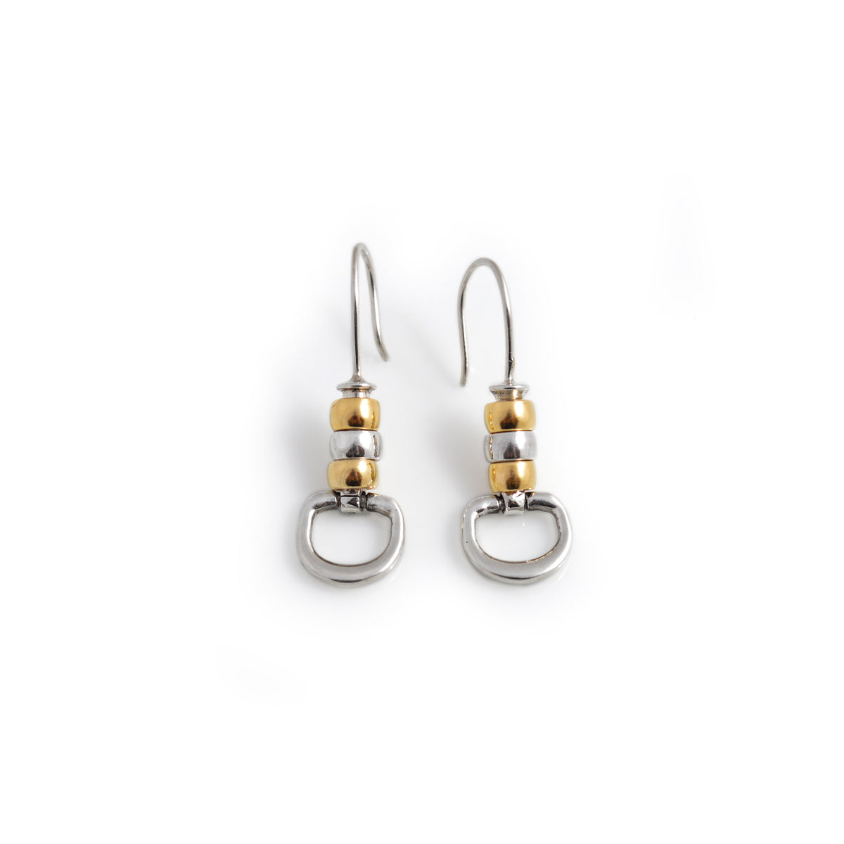 Pair of silver and gold earrings on a white background